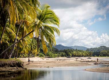 Paradise beach, white sand and blue sea, Playa Samara in Costa Rica