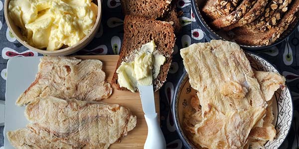 traditional food to try in iceland is hardfiskur dried fish with butter and dark rye bread