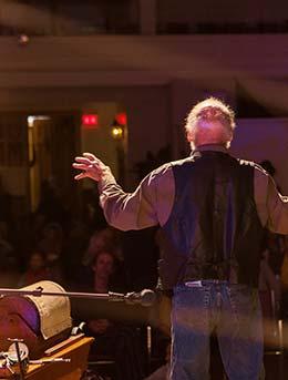 man doing a spoken word performance for hakaya cultural project in Jordan