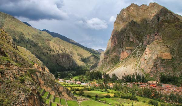 Adventure travel group tour visits ancient Incan ruins in Ollantaytambo whilst on their way toMachu Picchu, Peru holidays