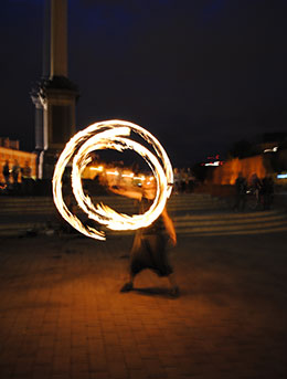 man performing a fire show for magicians carnival festival