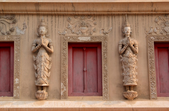 Marvel at the intricate carvings found at Chiang Mai's temples