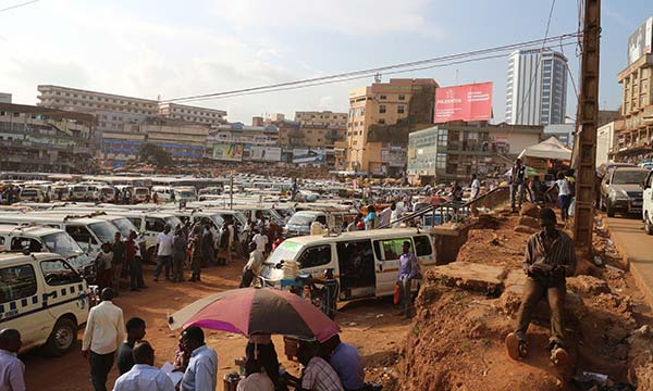 a group of taxis in uganda town center