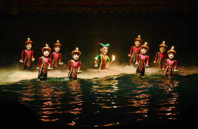 Watch a traditional water puppet show in one of Hanoi's dedicated stadiums