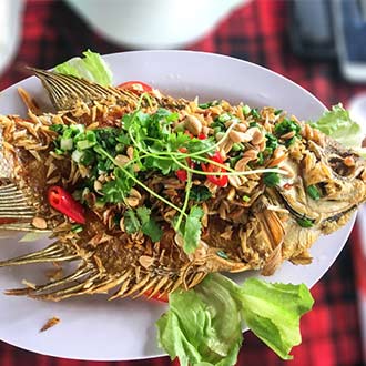 Mekong-Delta fried fish in Vietnam is a speciality