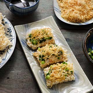 Vietnamese street food fried and dried rice with pork floss (Com chay cha bong)