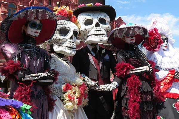 people dressed in skeleton costumes for parade day of the dead mexico event