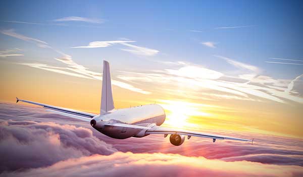 an aeroplane flying towards Cape Town