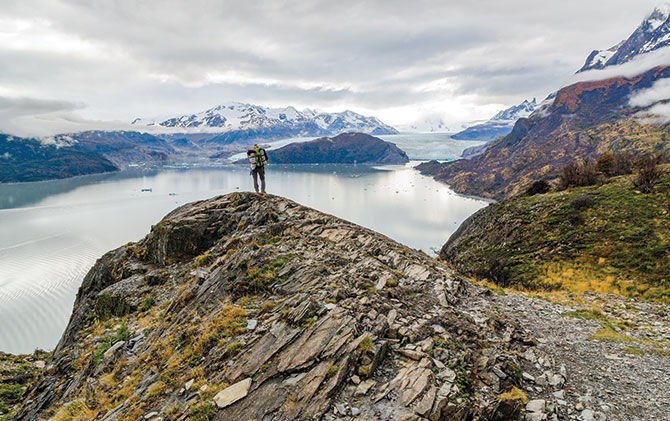 Solo traveller hiking in torres del paine national park, hiking in south america, hiking trips